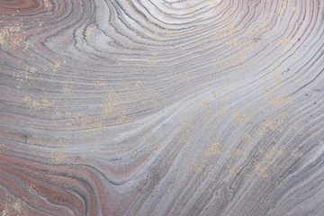 Fototapeta premium photography of abstract marbleized effect background. brown, orange, gray and white creative colors. Beautiful paint