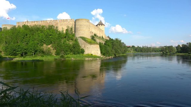 View of beautiful landscape with Ivangorod fortress across the Narva river.