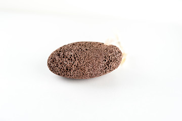 Natural pumice stone with for spa and bathroom on a white background.