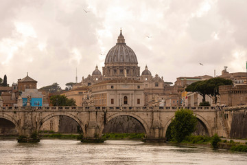 Fototapeta na wymiar View of the Vatican, St. Peter's Basilica, St. angel bridge over the Tiber river. Rome, Italy.