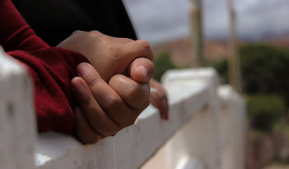 Hands on the bridge