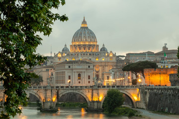 Fototapeta premium View of the Vatican, St. Peter's Basilica, St. angel bridge over the Tiber river. Rome, Italy.