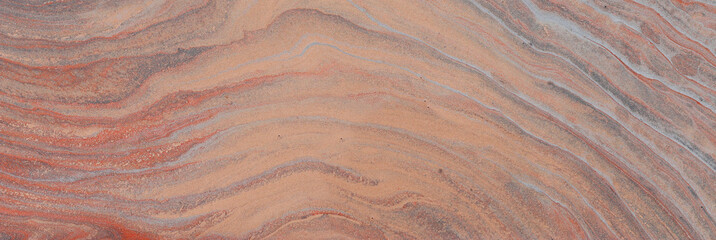 photography of abstract marbleized effect background. brown, orange, gray and white creative colors. Beautiful paint