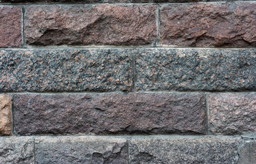 Vintage wall of heavy stone blocks