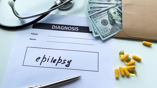 Diagnosis epilepsy in a medical form on the doctor desk