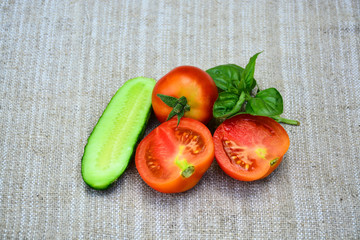  Fresh vegetables. Tomatoes, cucumber basil. Food