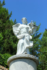 Classic white marble statue of a young lady angel, landscape decoration