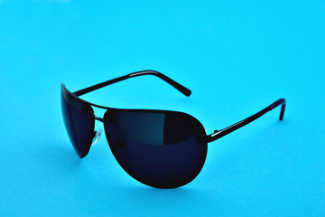 blue glasses on a blue background