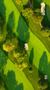 Aerial view of a golf course fairway and sand traps in autumn creating an abstract looking perspective at the Naperville Country Club in Napervile, IL - USA