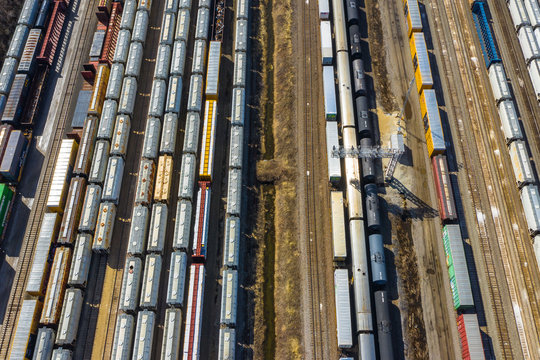 Aerial view of rail cars waiting at a staging railyard station in Aurora, IL - USA