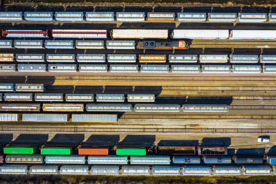Aerial view of rail cars waiting at a staging railyard station in Aurora, IL - USA