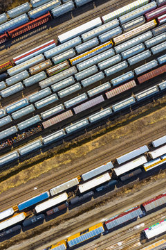 Aerial view of rail cars waiting at a staging railyard station in Aurora, IL - USA