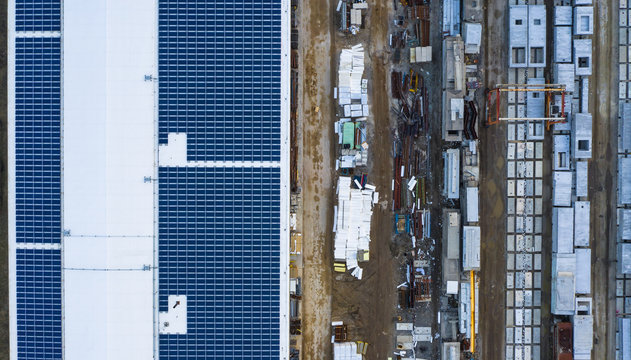Aerial view of finished concrete slabs and related products at a concrete manufacturing facility in the afternoon sun in Aurora, IL, USA