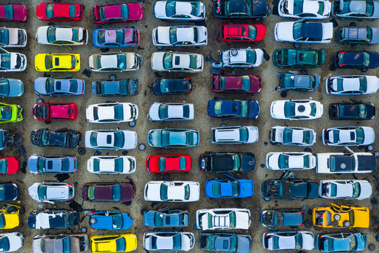 Aerial view of rows of old cars that have served, assembled in a junk yard waiting to be recycled for their reusable parts, Aurora, IL, USA.