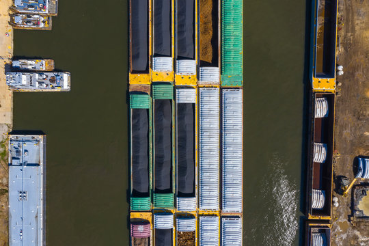 Aerial view of freight barges at a freight harbour on the Des Plaines River in Lemont, IL
