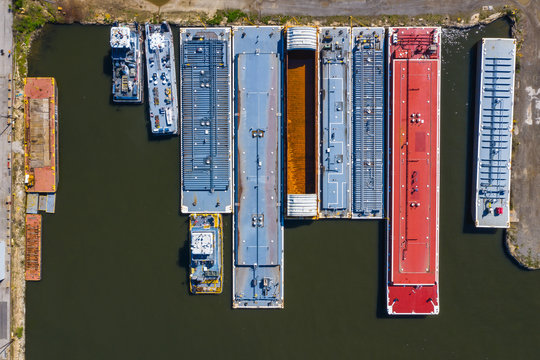 Aerial view of freight barges at a freight harbour on the Des Plaines River in Lemont, IL
