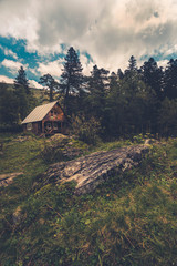mountain landscape, the house stands at the foot of the mountain