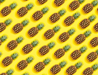 Pineapple pattern on yellow background. Minimal concept. top view