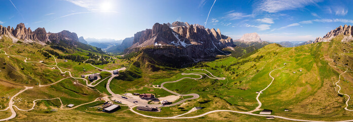 Aerial top view from drone to wonderful alpine landscape and meadows at Pass Gardena with majestic...