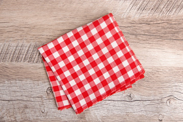  Red cloth in a cage on a wooden table
