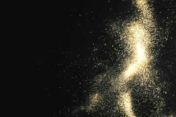 Abstract black and gold festive glitter shimmering magic luxury background with copy space. de-focused