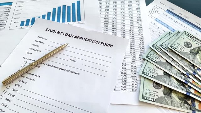 Student loan application form document on table