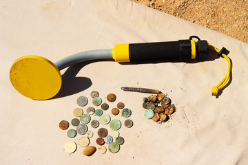 The photo of gold and silver  coins collected with help of underwater metal detector. Treasure...