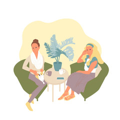 two female friends sitting in a cafe