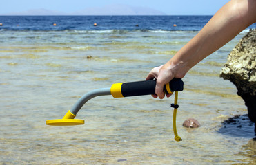 The photo of gold and silver  coins collected with help of underwater metal detector. Treasure...