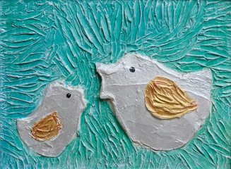 The bas-relief - `two birds`, handmade - made by putty and painted with acrylic paints