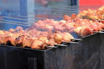 cooking on fire on a city street