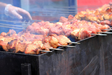 cooking on fire on a city street