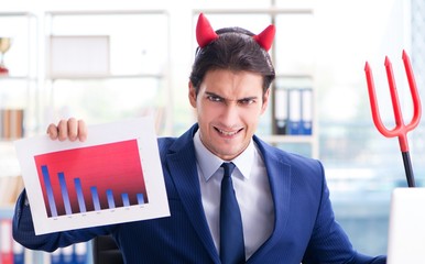 Devil angry businessman in the office