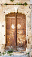 Fototapeta na wymiar Public Old Brown Metal Antique Door