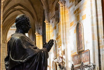 Naklejka premium Priest sculpture in bronze