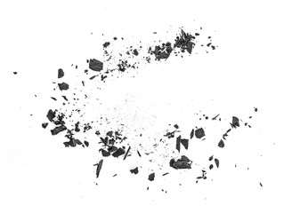 Black coal dust with fragments isolated on white background, top view.