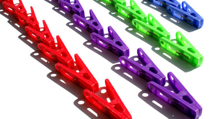 bright blue, red, green and purple objects are arranged in a straight line in a strictly defined diagonal order on a white background