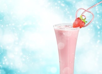 Glass of delicious strawberry cocktail isolated on white background