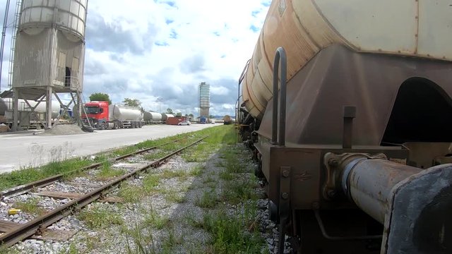 Wagons for liquids waits for further transportation on train depot