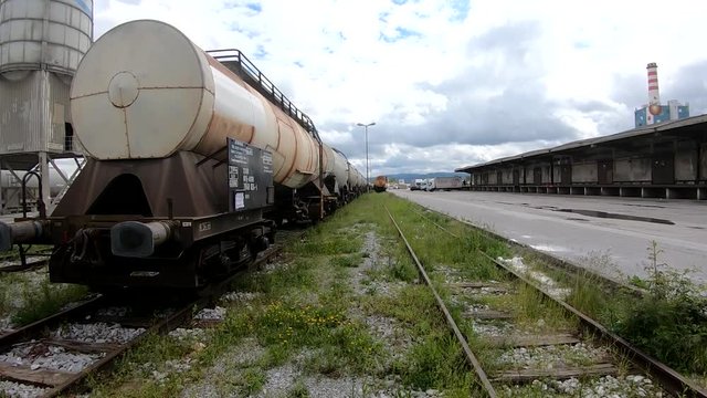 Wagons for liquids waits for further transportation on train depot