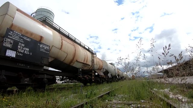 Wagons for liquids waits for further transportation on train depot