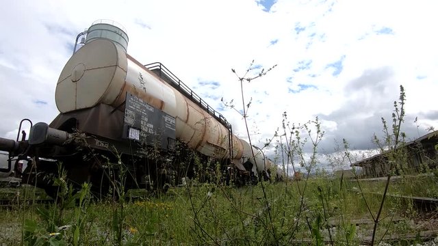 SLOWMO Wagons for liquids waits for further transportation on train depot