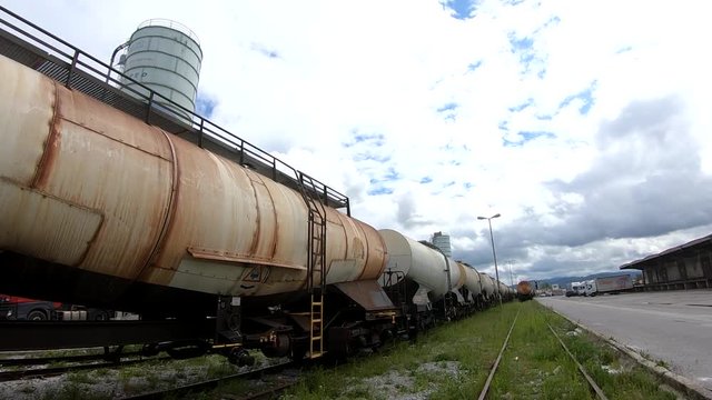 Wagons for liquids waits for further transportation on train depot