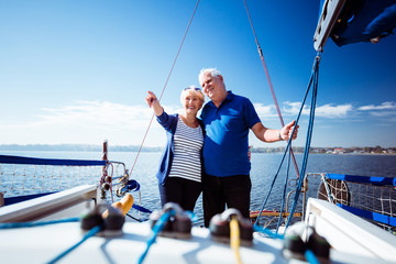 Couple relaxing in sailboat during summer vacation