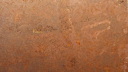 texture of red rust on brown paint