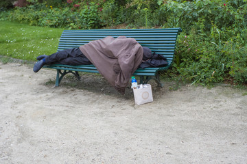  the Parisian bum sleeps on a bench