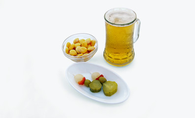 typical spanish tapas and  beer in jug, isolated on a white background