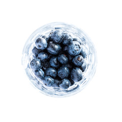 blueberries in a bowl isolated on white background