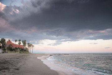 sunset on a beach in spain