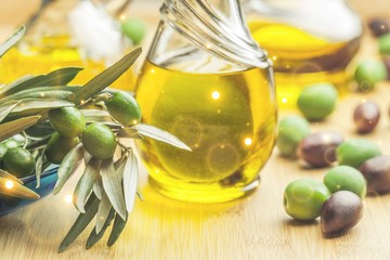 Bottle of Olive Oil with Green and Black Olives